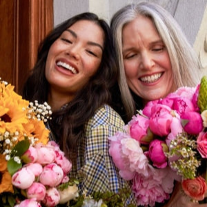 Women enjoying their flowers