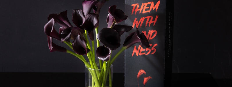 Close up of Halloween bouquet of Midnight Calla Lilies.