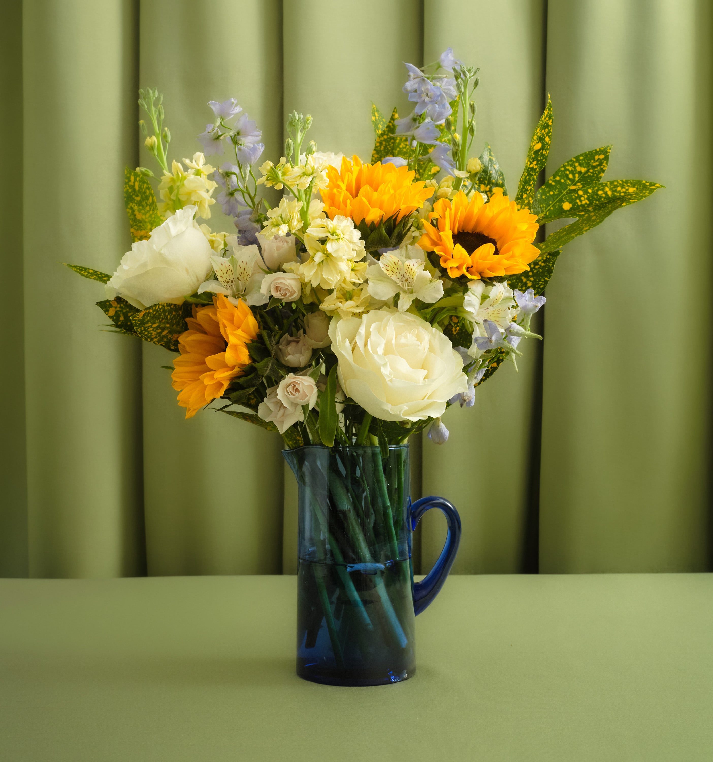 The Picket Fence with Moroccan Glass Pitcher | UrbanStems Flower